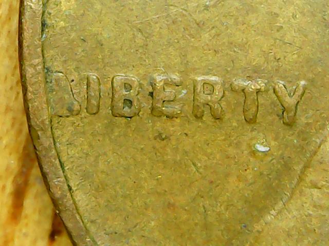 Is-This-A-Die-Chip-On-The-L-In-Liberty-On-This-1942-Wheat-Penny?